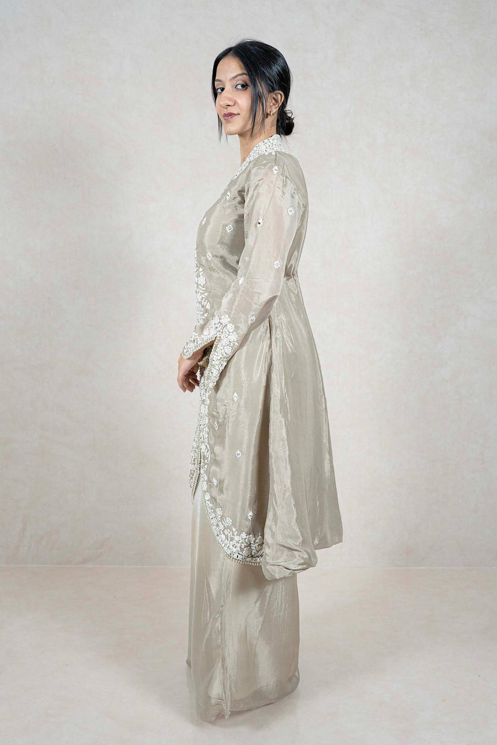Raysham Fashion beige silk-blend long jacket with white floral embroidery and mirror work paired with wide-leg trousers