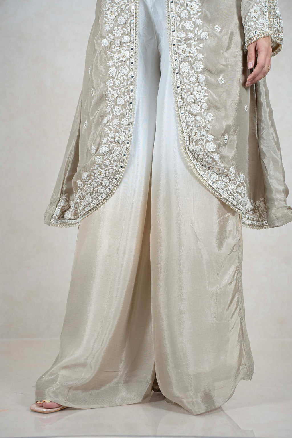 Raysham Fashion beige silk-blend long jacket with white floral embroidery and mirror work paired with wide-leg trousers
