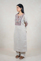 Raysham Fashion beige linen kurta set with intricate blue, orange, and brown floral embroidery on neckline and sleeves