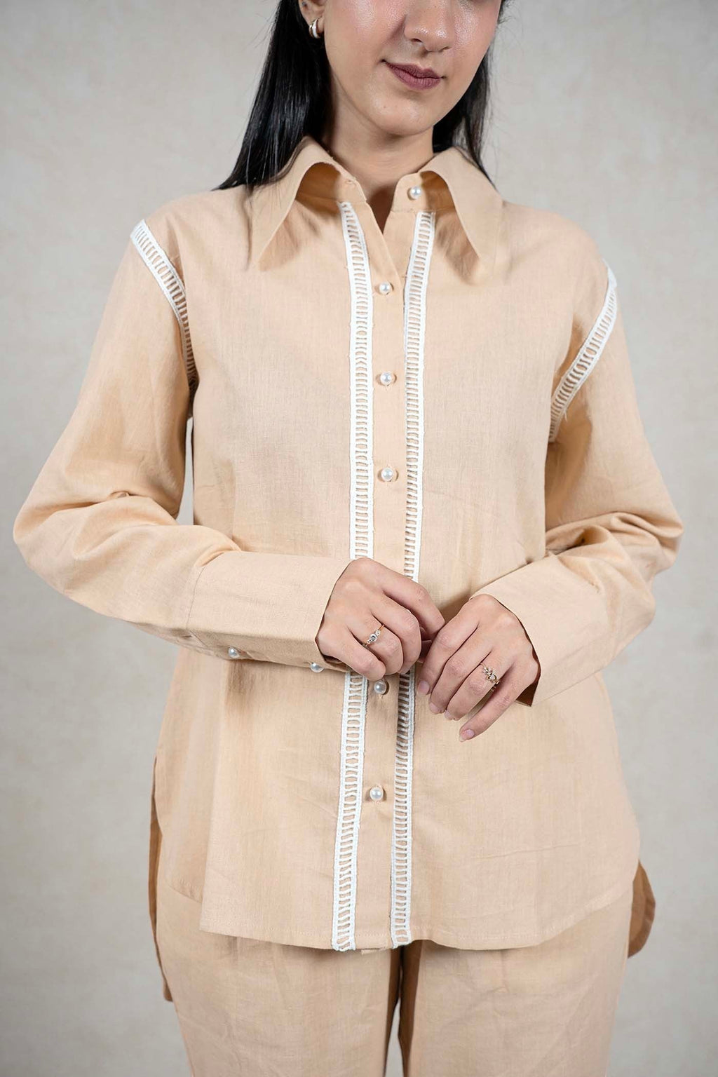 Raysham Fashion beige linen-blend long sleeve shirt with white lace trim and pearl buttons on a woman