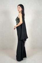 Raysham Fashion black co-ord set with embroidered crop top, wide-leg trousers, and a side drape, side view.
