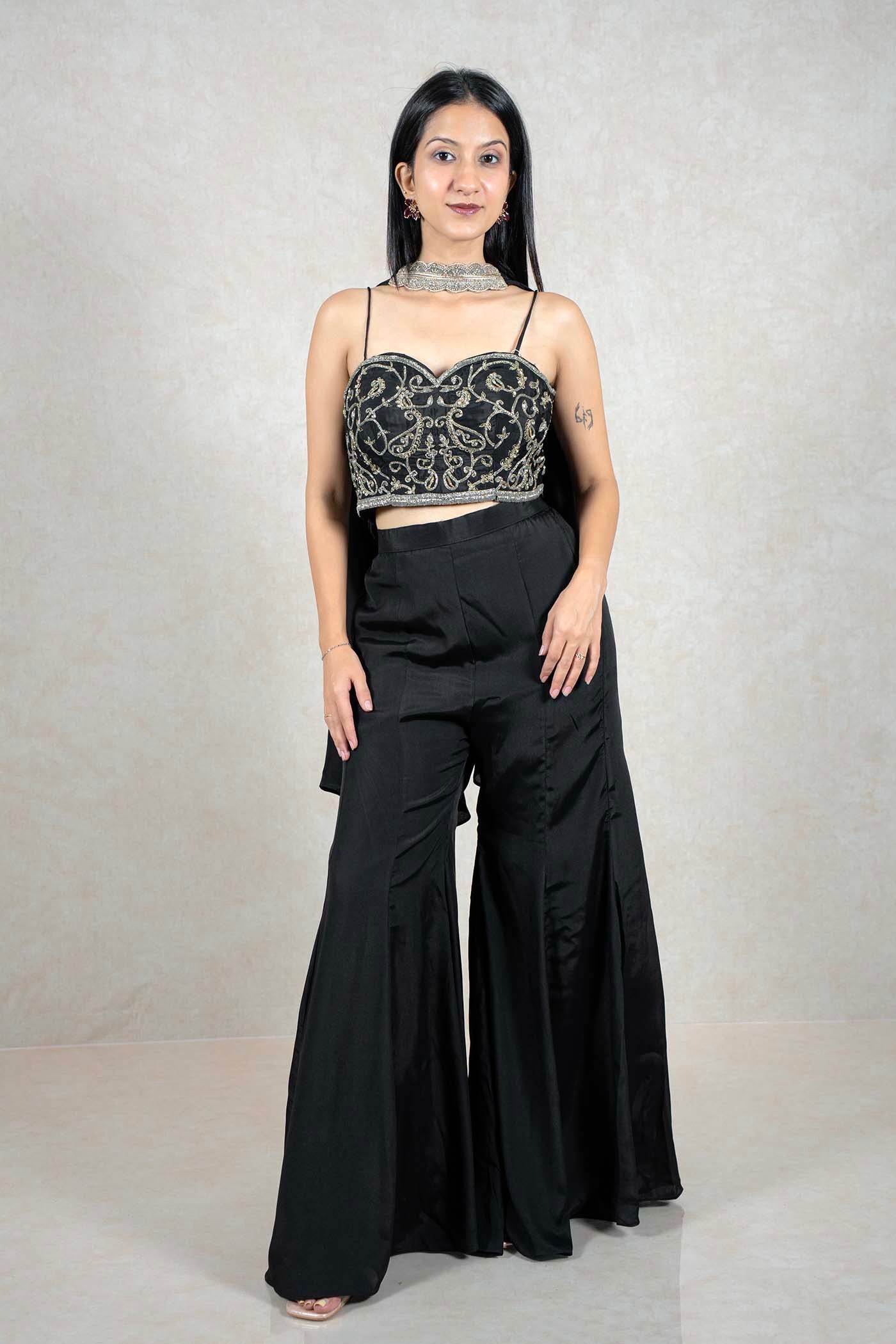 Raysham Fashion black co-ord set with embroidered bustier crop top and high-waisted wide-leg trousers on a model.