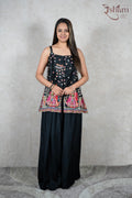 Raysham Fashion black sleeveless peplum top with floral print and hand-painted hem paired with wide-leg trousers