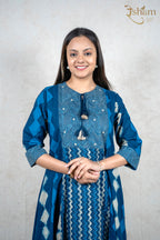 Raysham Fashion deep blue cotton kurta with geometric patterns, tassel neckline, and three-quarter sleeves on a model