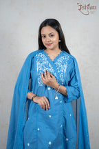 Raysham Fashion sky-blue cotton kurta set featuring white floral embroidery on the yoke and delicate lace trim details.
