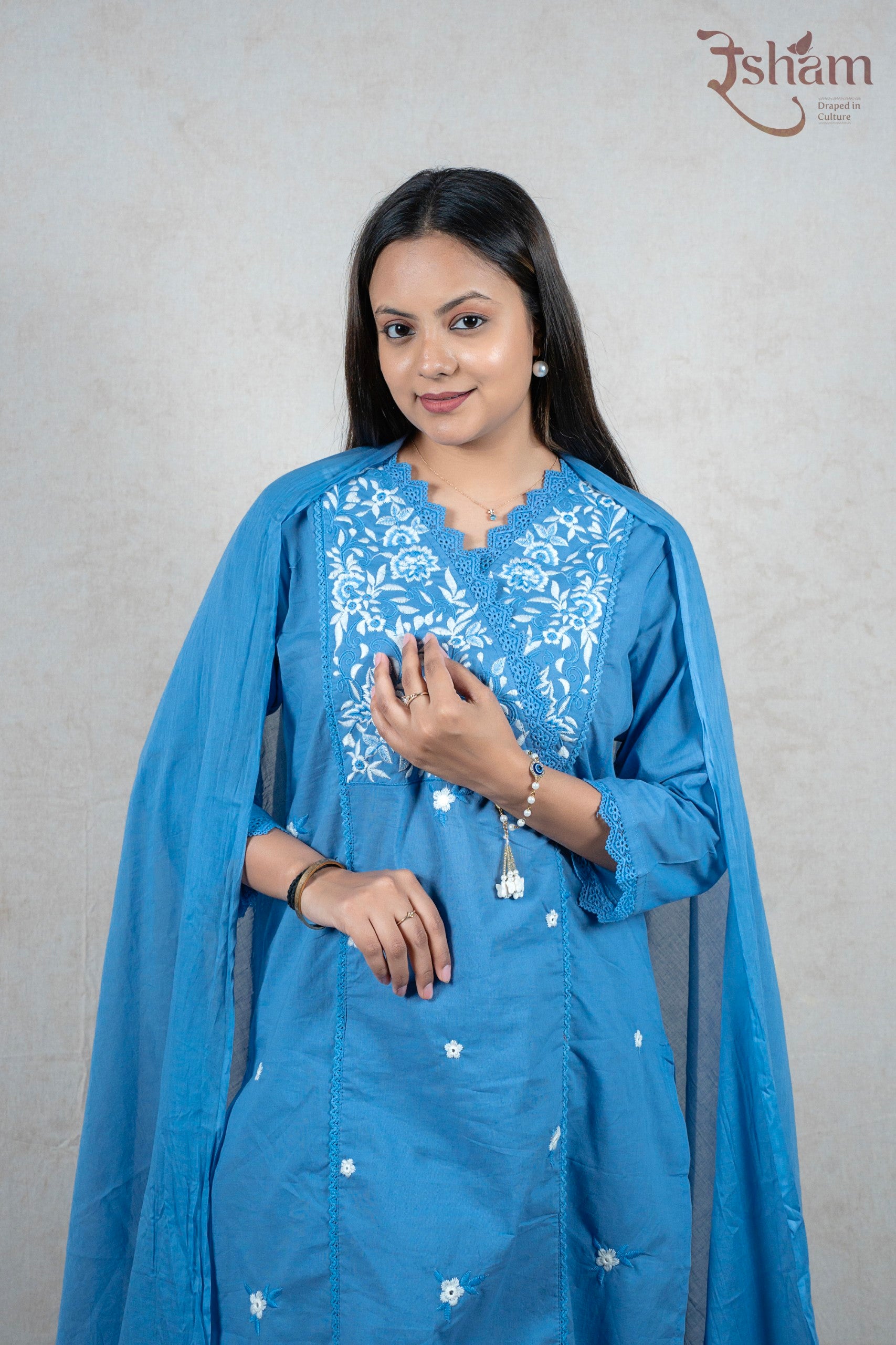 Raysham Fashion sky-blue cotton kurta set featuring white floral embroidery on the yoke and delicate lace trim details.