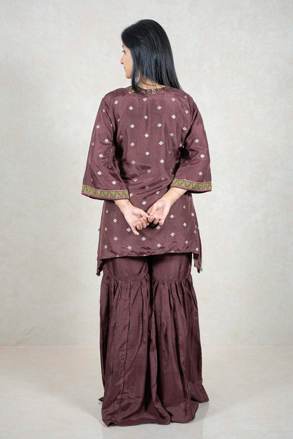 Raysham Fashion deep chocolate brown embroidered kurta and sharara set with geometric sleeve borders, back view