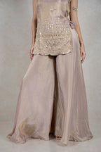 Raysham Fashion champagne sleeveless kurta with mirror work embroidery and matching wide-leg palazzo pants