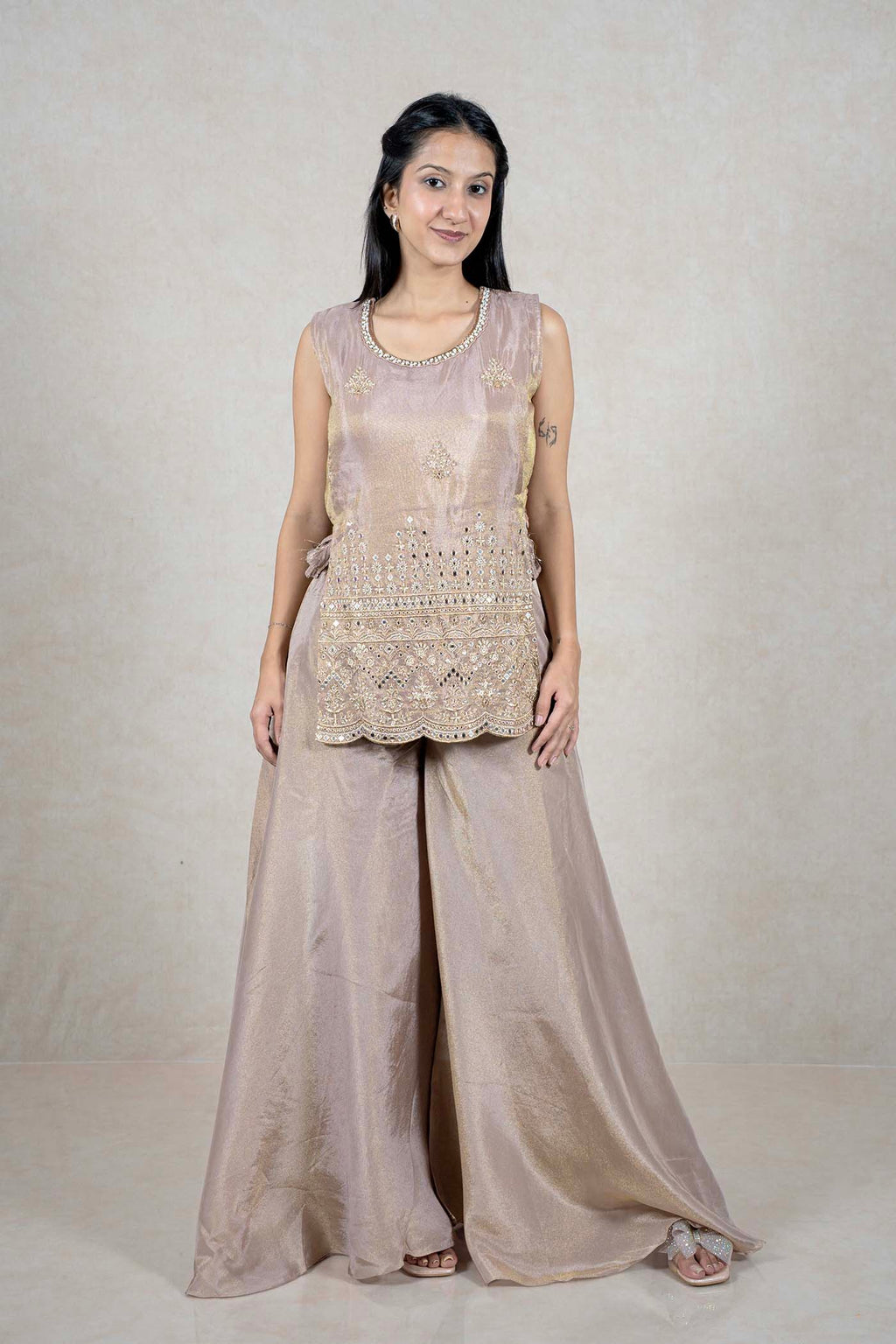 Raysham Fashion champagne sleeveless kurta with mirror work embroidery and matching wide-leg palazzo pants