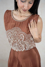 Raysham Fashion chocolate brown sleeveless jumpsuit with intricate silver embroidery on the bodice