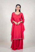 Raysham Fashion crimson red silk-blend kurta set with gold embroidery, matching dupatta, and wide-leg trousers.