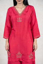 Raysham Fashion crimson red silk-blend kurta with intricate gold embroidery on the V-neckline and hem