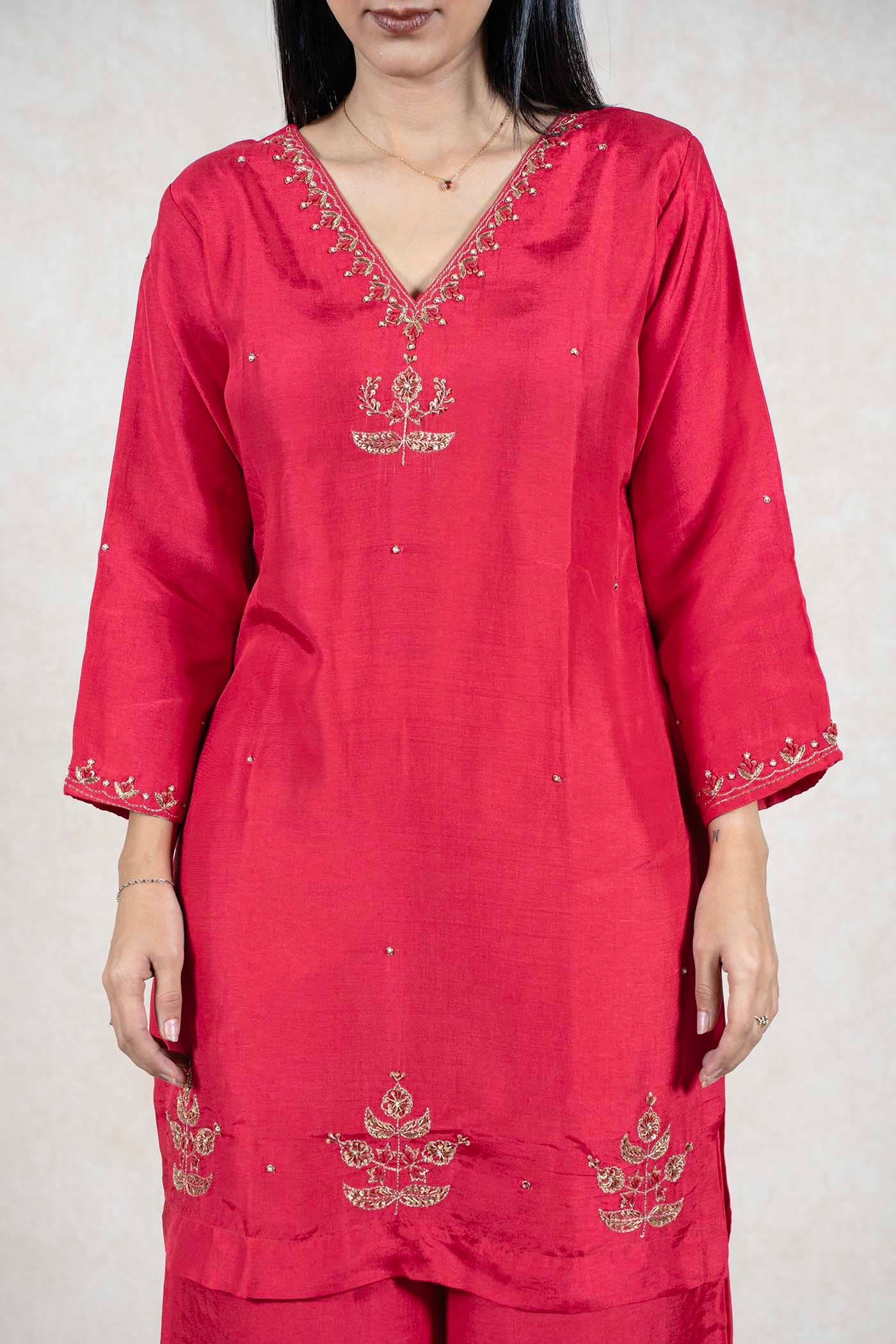 Raysham Fashion crimson red silk-blend kurta with intricate gold embroidery on the V-neckline and hem
