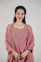 Raysham Fashion dusty rose silk-blend kurta set with intricate gold embroidery, sequins, and a matching sheer dupatta.