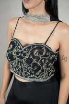 Raysham Fashion black sleeveless crop top with intricate silver and gold embroidery and a sweetheart neckline.