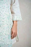 Raysham Fashion off-white cotton kurta with mint green floral embroidery, sequin accents, and scalloped lace cuffs.