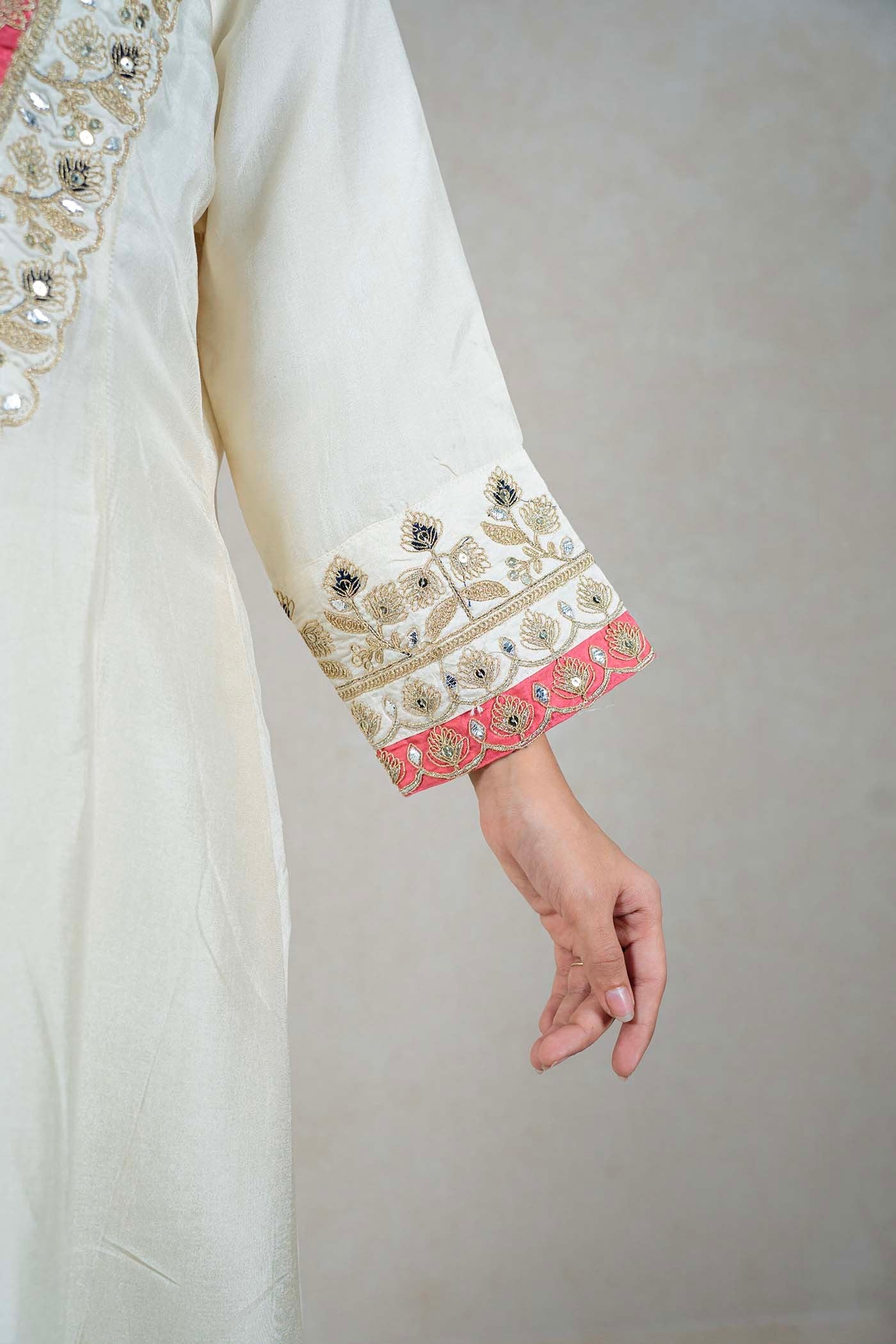 Raysham Fashion off-white silk-blend kurta sleeve with coral-pink floral embroidery, mirror work, and scalloped hem