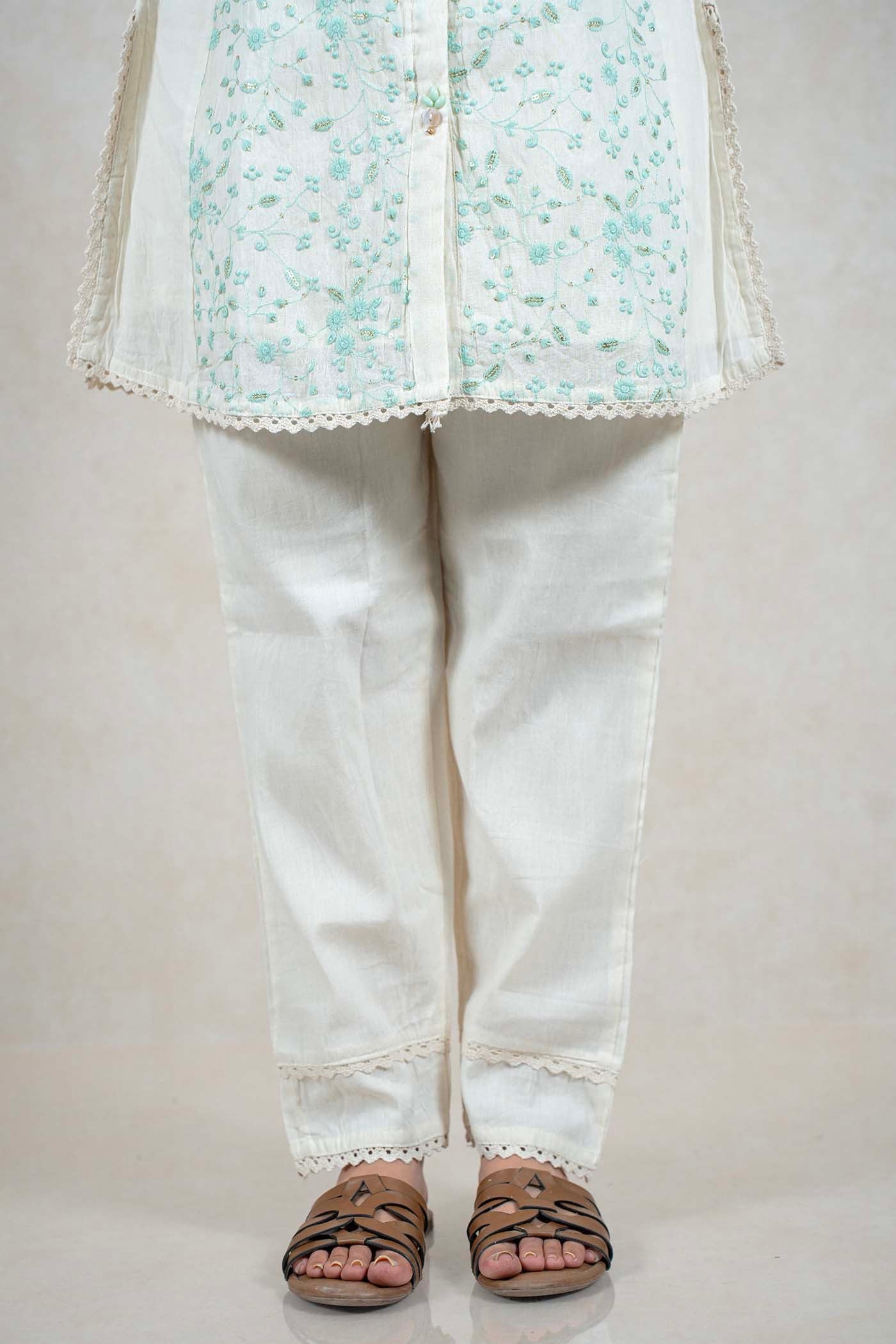Raysham Fashion off-white cotton kurta and trouser set with mint green floral embroidery and scalloped lace trim