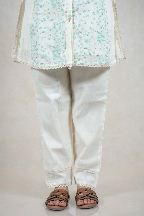 Raysham Fashion off-white cotton kurta and trouser set with mint green floral embroidery and scalloped lace trim