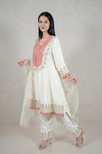 Raysham Fashion off-white silk-blend kurta set with coral floral embroidery, mirror work, and matching sheer dupatta