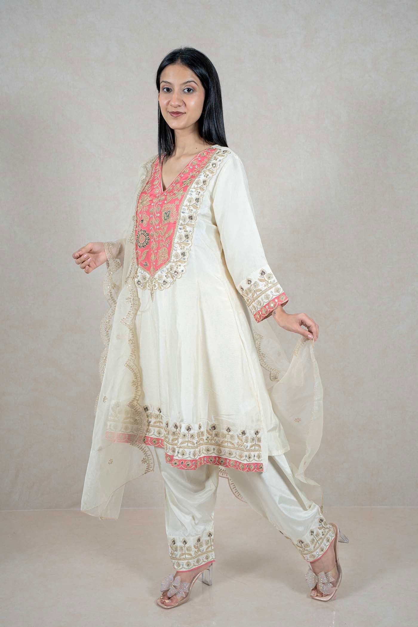 Raysham Fashion off-white silk-blend kurta set with coral floral embroidery, mirror work, and matching sheer dupatta