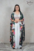 Raysham Fashion floral print cape set featuring an embellished sleeveless blouse and solid white wide-leg trousers.