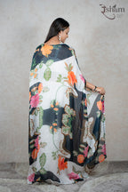 Raysham Fashion floral print sheer cape shrug worn over a white outfit, showcasing vibrant botanical patterns.