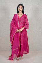 Raysham Fashion fuchsia silk-blend kurta set with white floral embroidery, V-neck, and gold-trimmed matching dupatta.