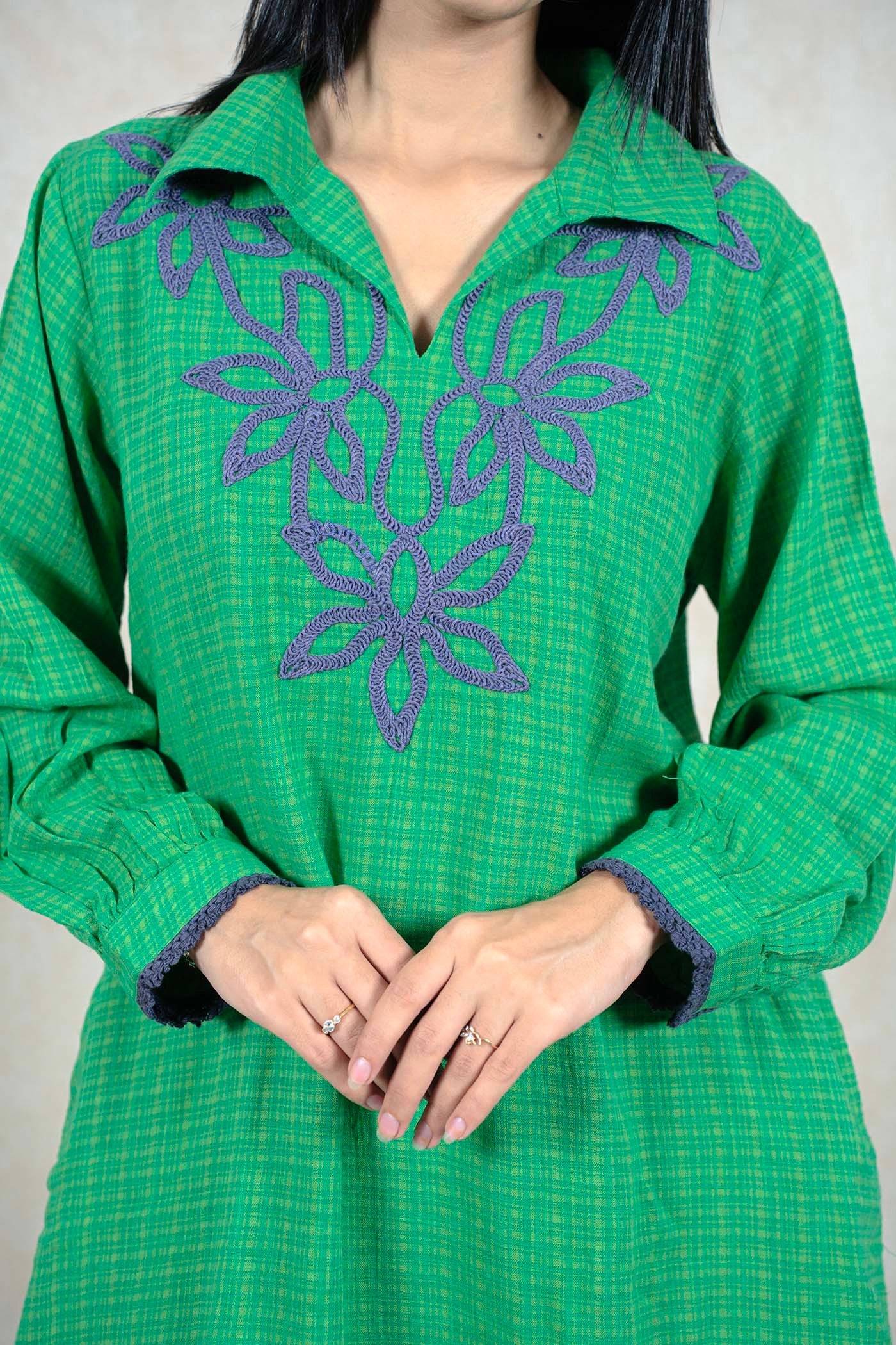 Raysham Fashion green checkered kurta with purple floral embroidery on the neckline and lace trim on the cuffs.