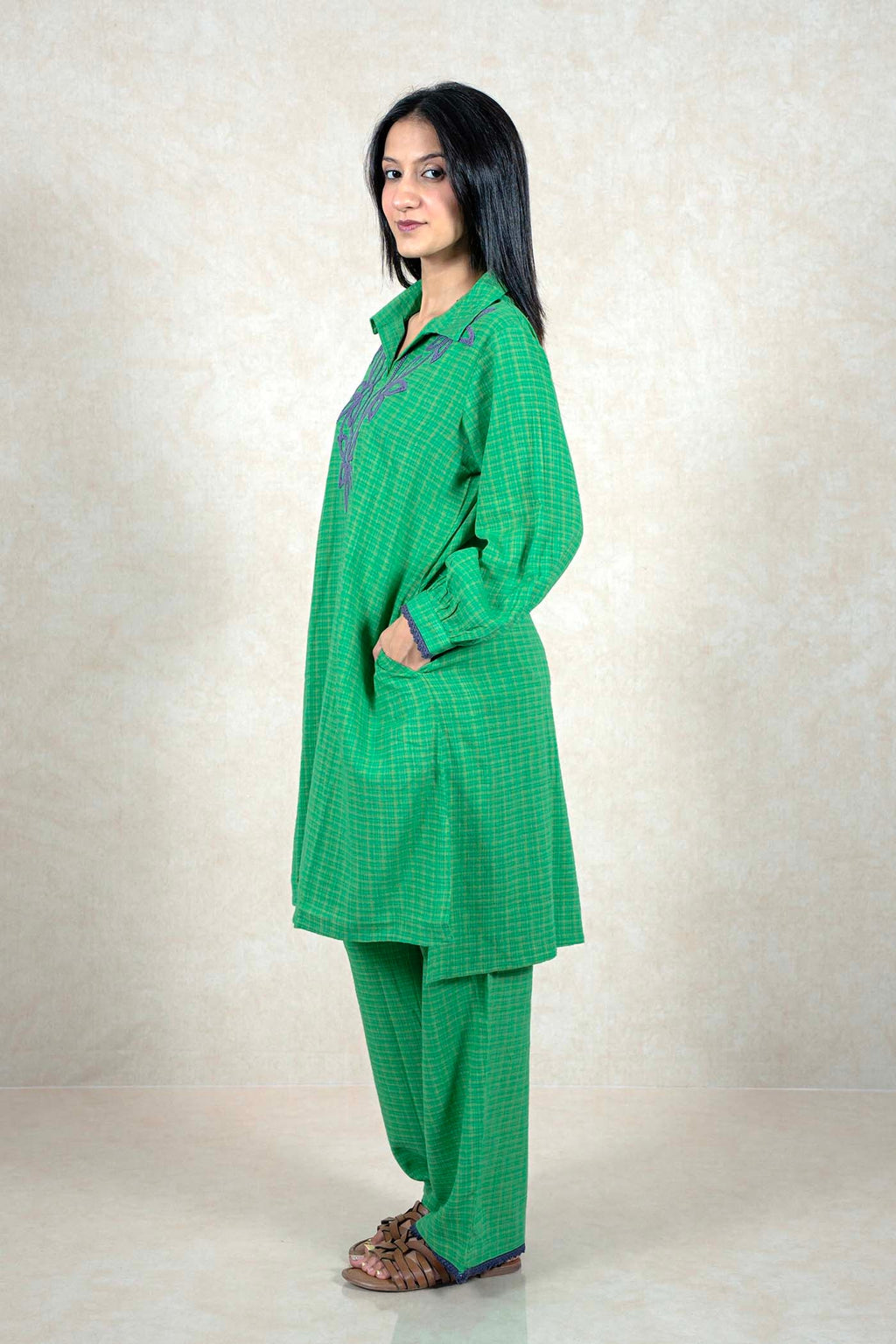 Raysham Fashion green checkered kurta and trouser set with purple floral embroidery and lace trim on a model