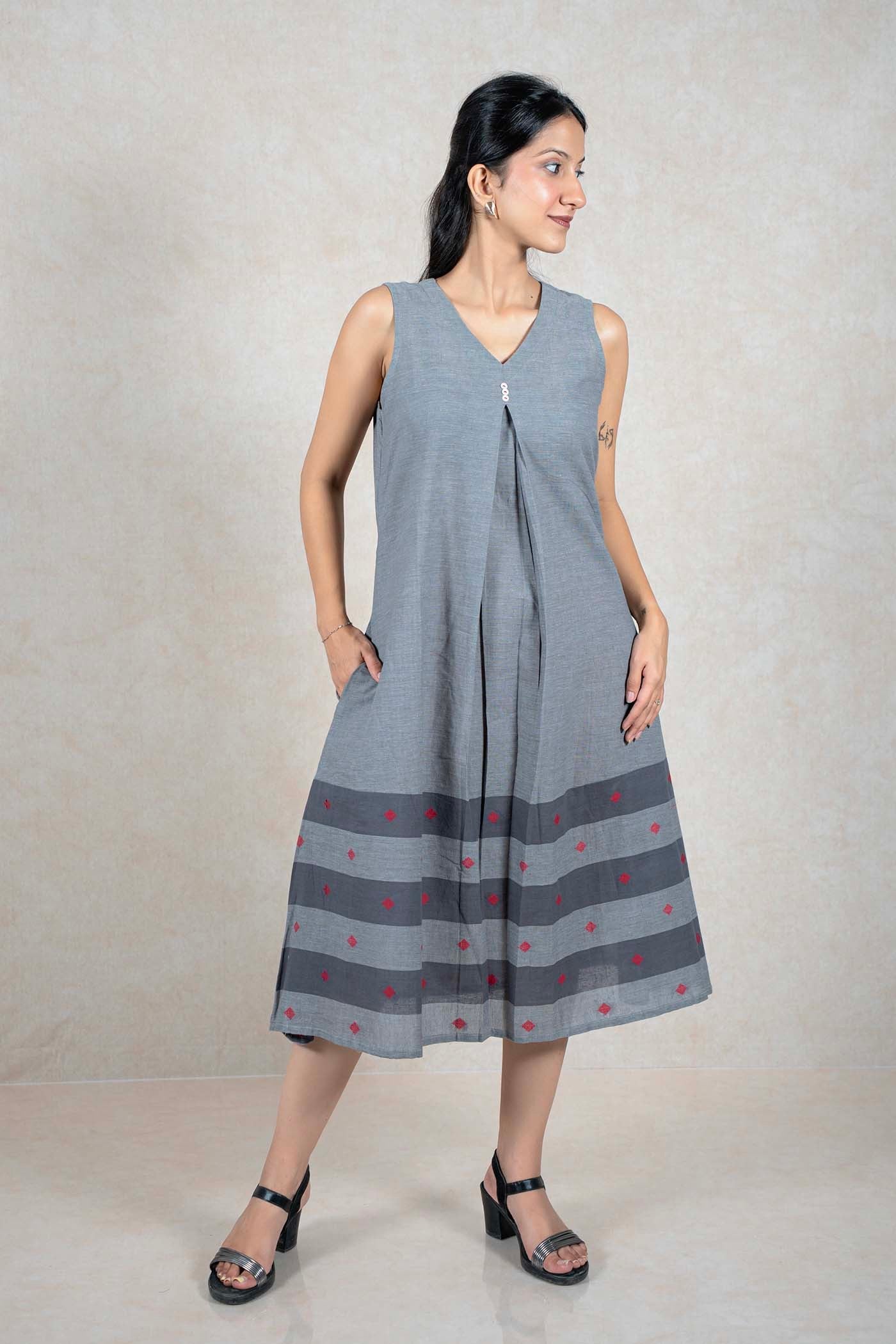 Raysham Fashion grey sleeveless cotton midi dress with V-neck, central pleat, side pockets, and striped embroidered hem