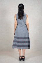 Raysham Fashion grey sleeveless cotton midi dress with a striped hem and red diamond embroidery, back view.