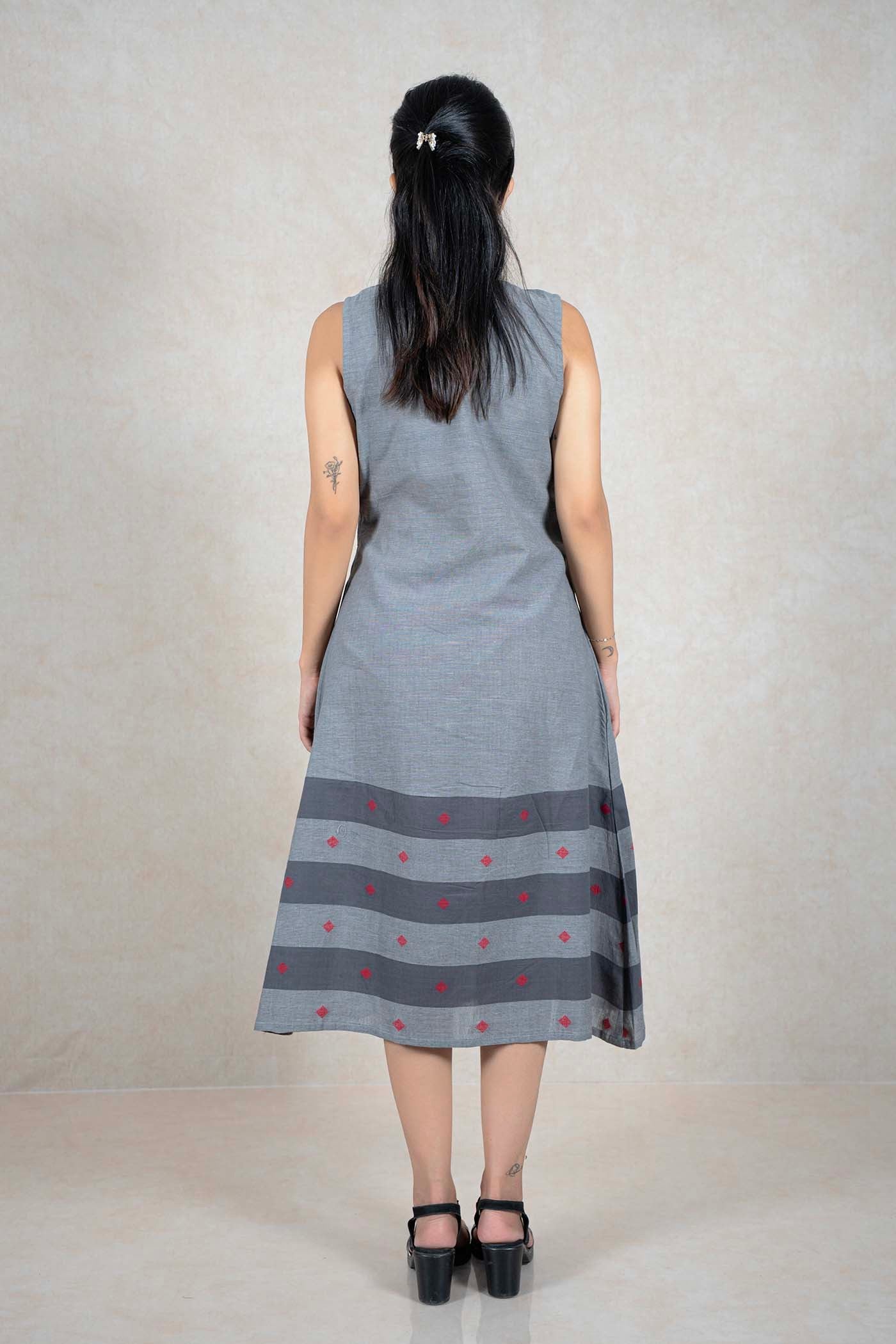 Raysham Fashion grey sleeveless cotton midi dress with a striped hem and red diamond embroidery, back view.