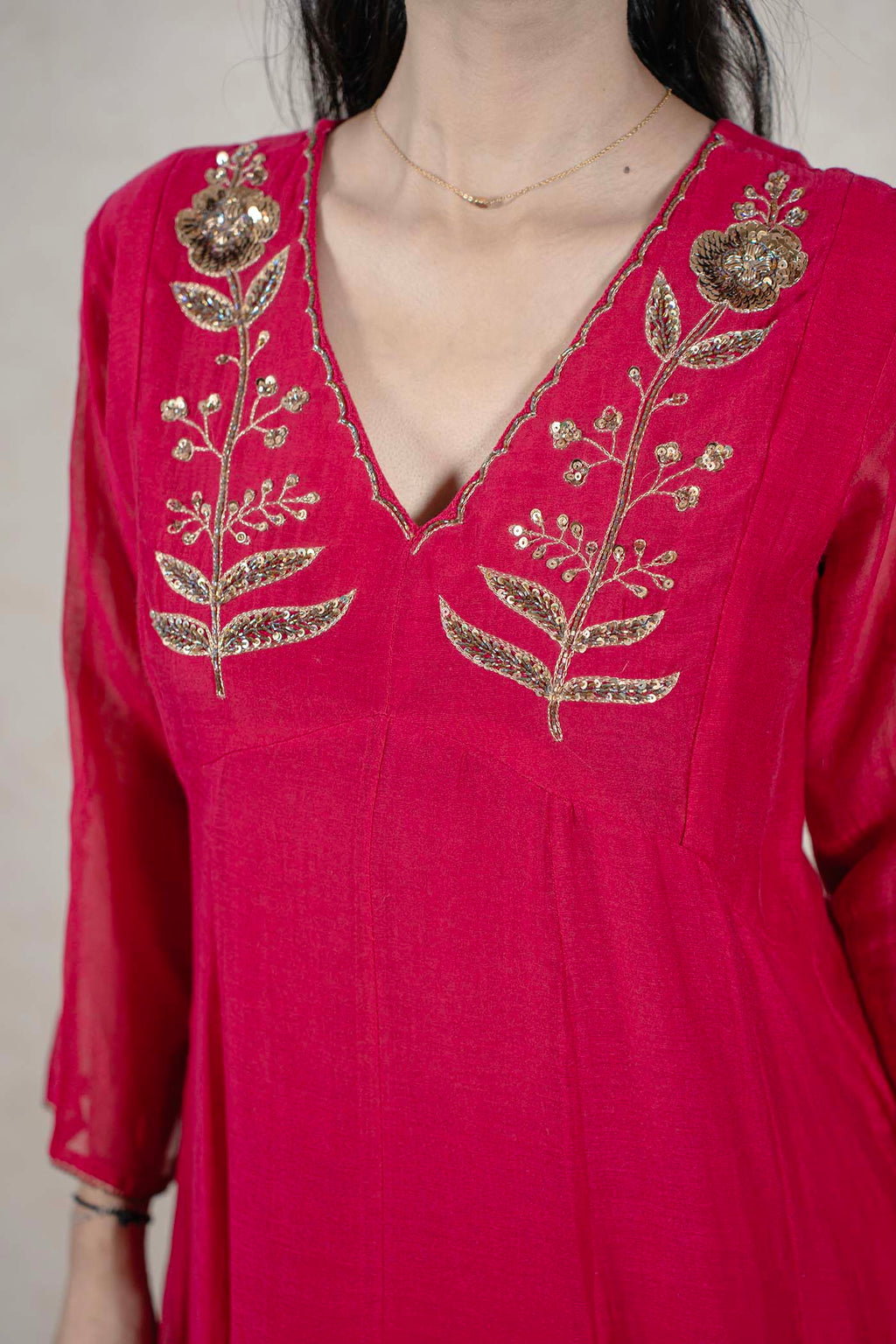 Raysham Fashion deep magenta Anarkali kurta with gold floral embroidery and sequin work on a V-neckline