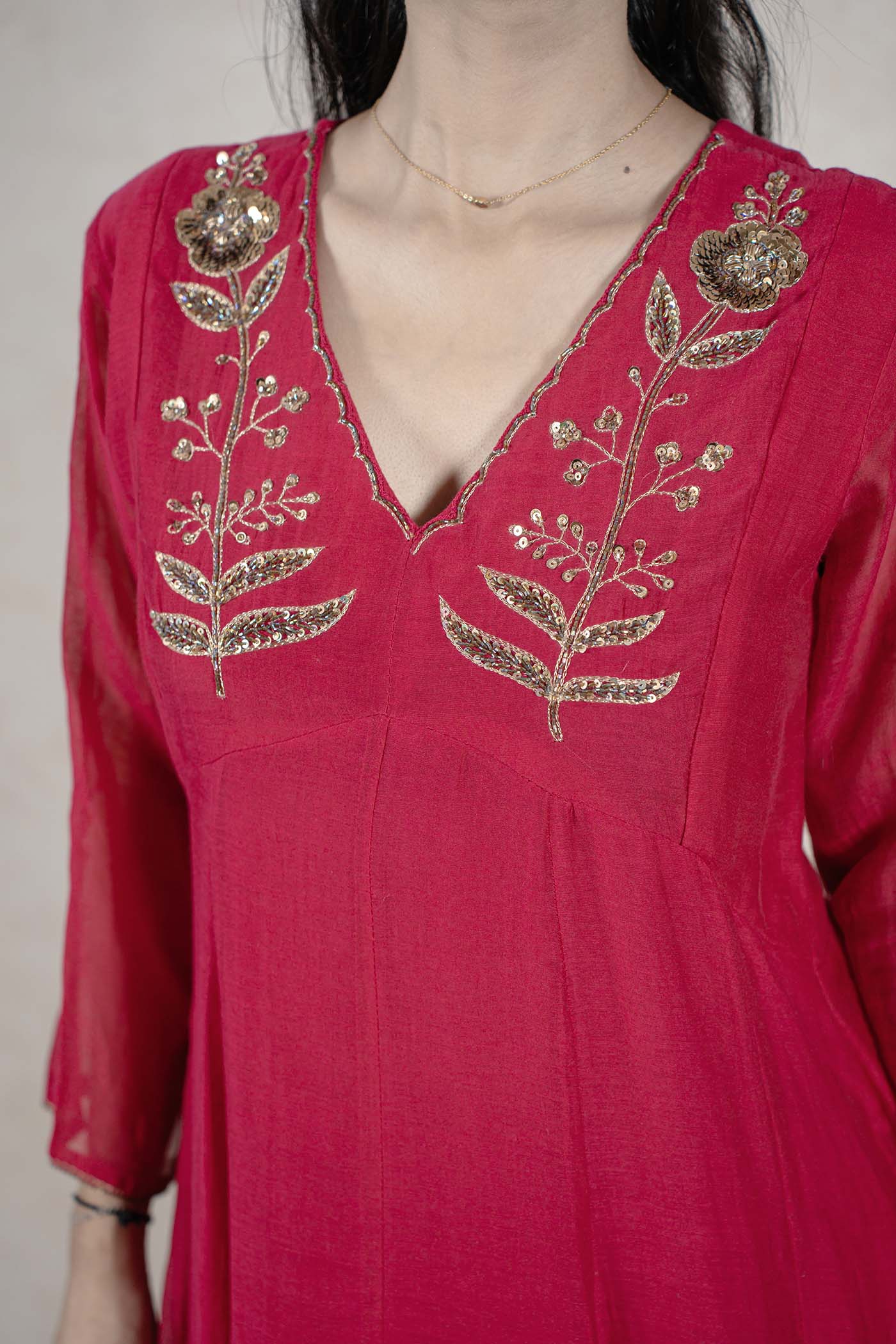 Raysham Fashion deep magenta Anarkali kurta with gold floral embroidery and sequin work on a V-neckline