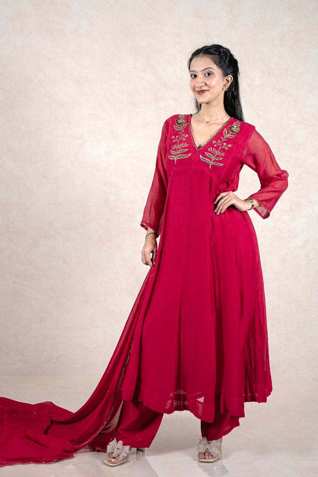 Raysham Fashion deep magenta Anarkali suit with gold floral embroidery, sequin work, and sheer dupatta on a model.