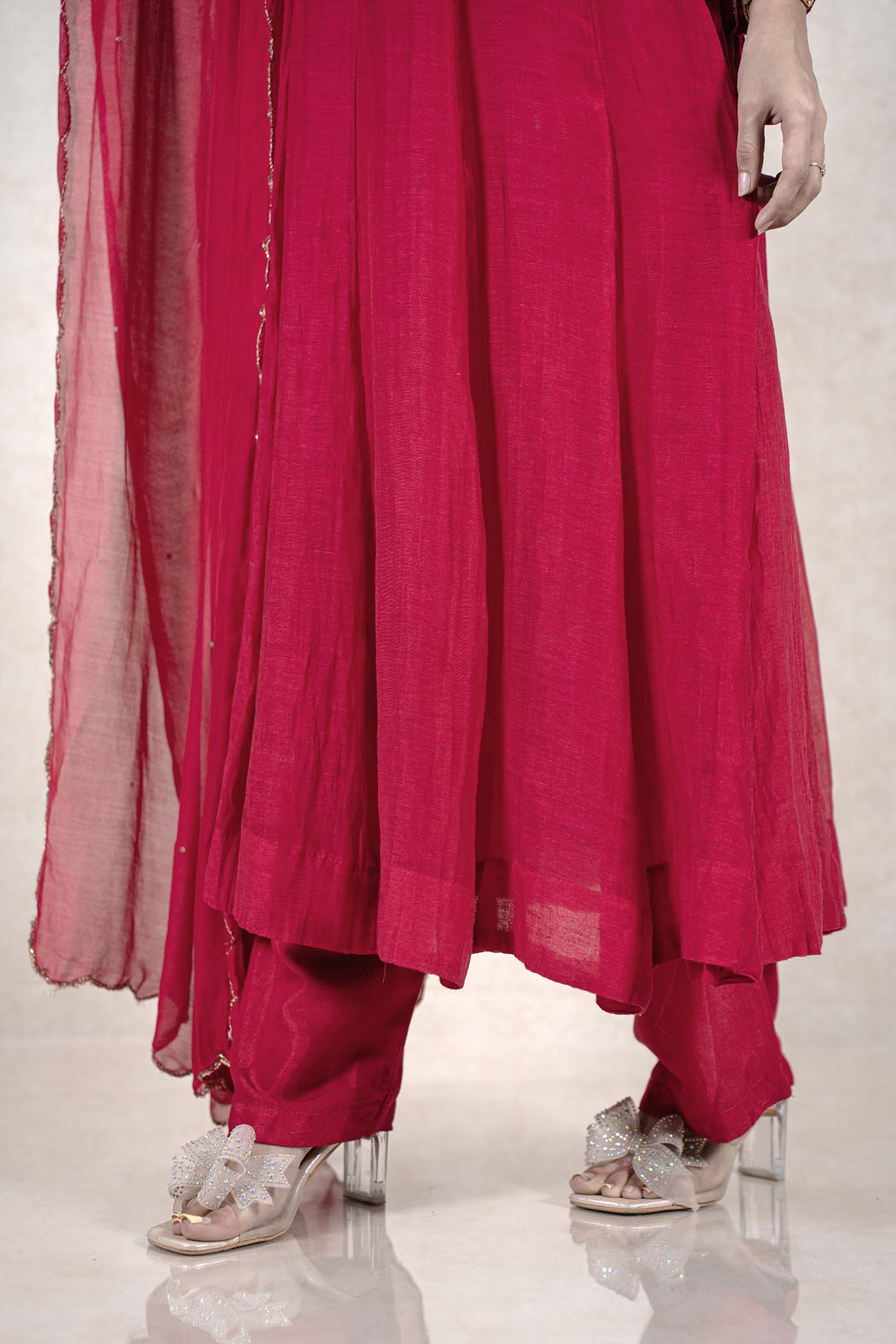 Raysham Fashion deep magenta Anarkali suit with flared kurta, matching trousers, and sheer dupatta with gold trim.