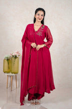 Raysham Fashion deep magenta Anarkali suit with gold floral embroidery, sequin work, and a matching sheer dupatta.