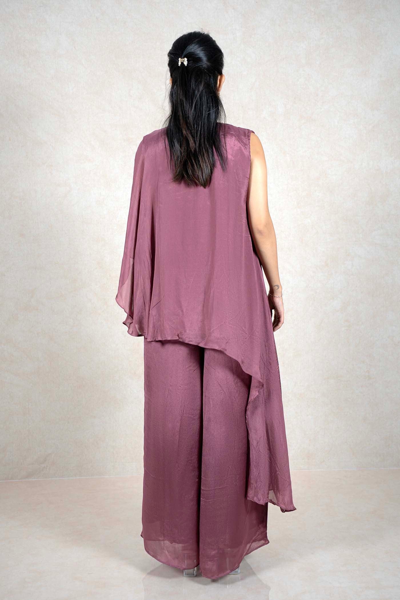 Back view of a Raysham Fashion mauve asymmetrical tunic and wide-leg pants set in lightweight fabric