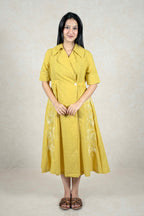 Raysham Fashion mustard yellow midi dress with a lapel collar, white side embroidery, and an elasticated waist.