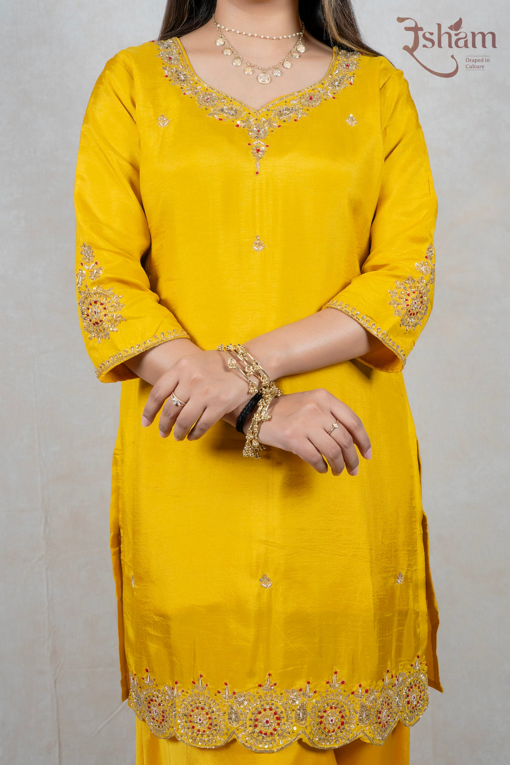 Raysham Fashion mustard yellow silk kurta with intricate gold embroidery, sequins, and beadwork on neckline and hem