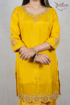 Raysham Fashion mustard yellow silk kurta with intricate gold embroidery, sequins, and beadwork on neckline and hem