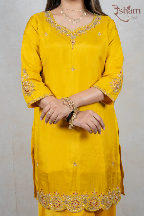 Raysham Fashion mustard yellow silk kurta with intricate gold embroidery, sequins, and beadwork on neckline and hem
