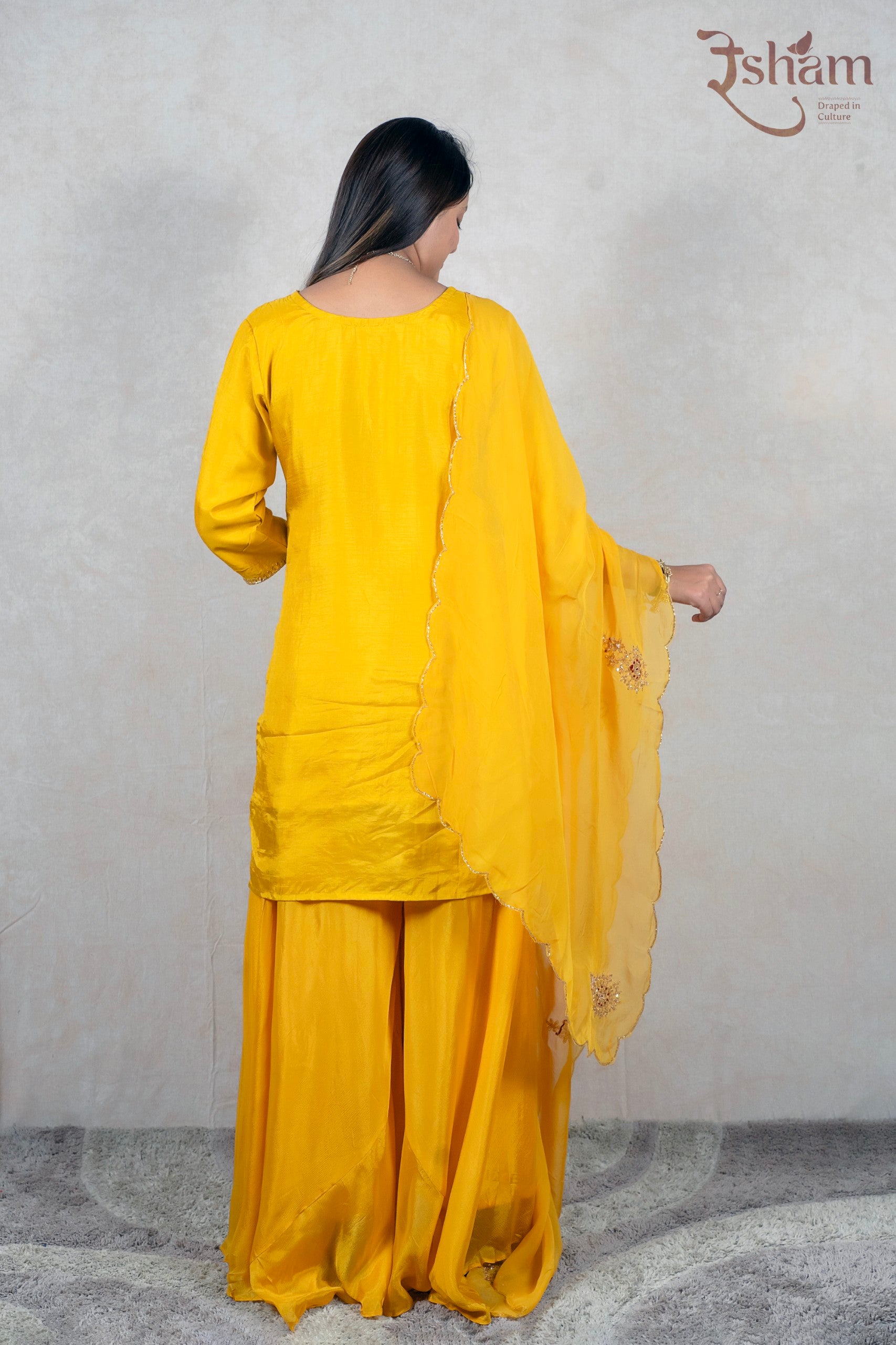 Raysham Fashion mustard yellow silk kurta set with flared palazzo and sheer scalloped dupatta, back view