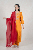 Raysham Fashion mustard yellow silk-blend kurta set with intricate embroidery and a sheer red dupatta