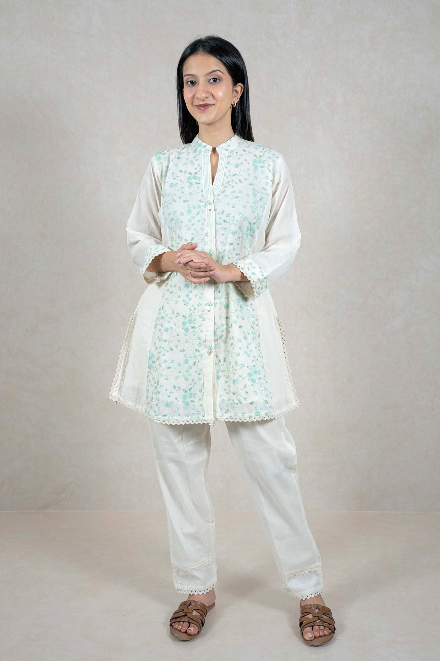 Raysham Fashion off-white cotton kurta set with mint green floral embroidery, mandarin collar, and scalloped lace trim.