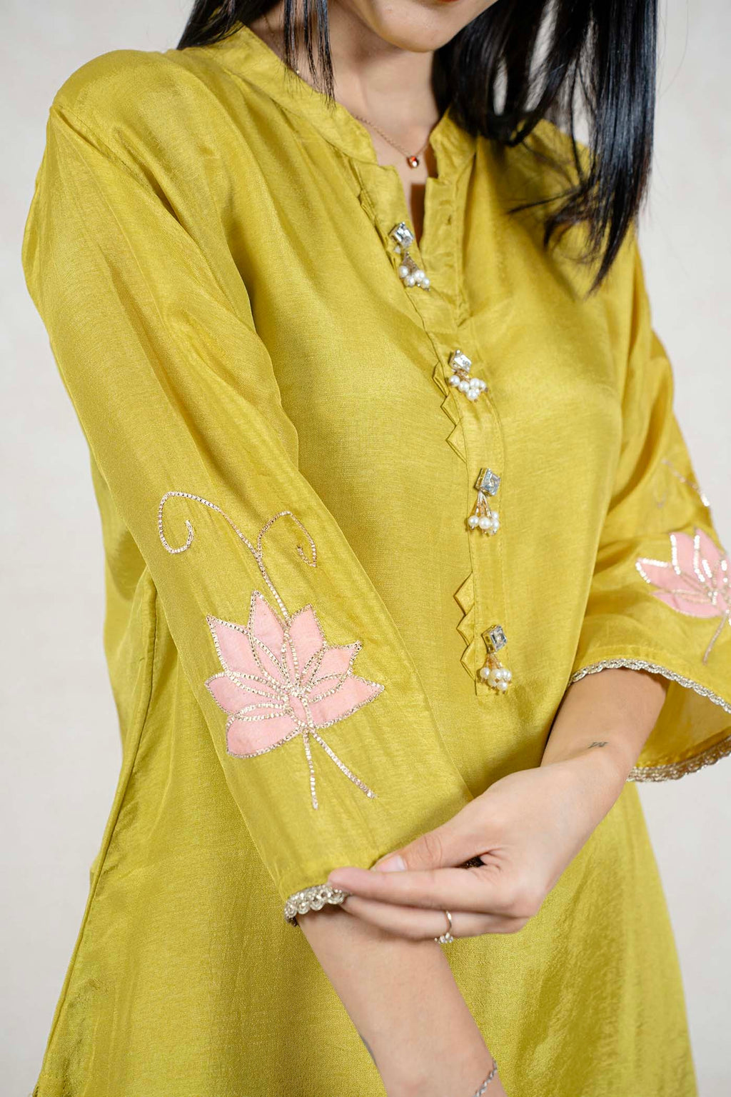 Raysham Fashion olive green silk kurta with pink floral embroidery, pearl accents, and three-quarter sleeves