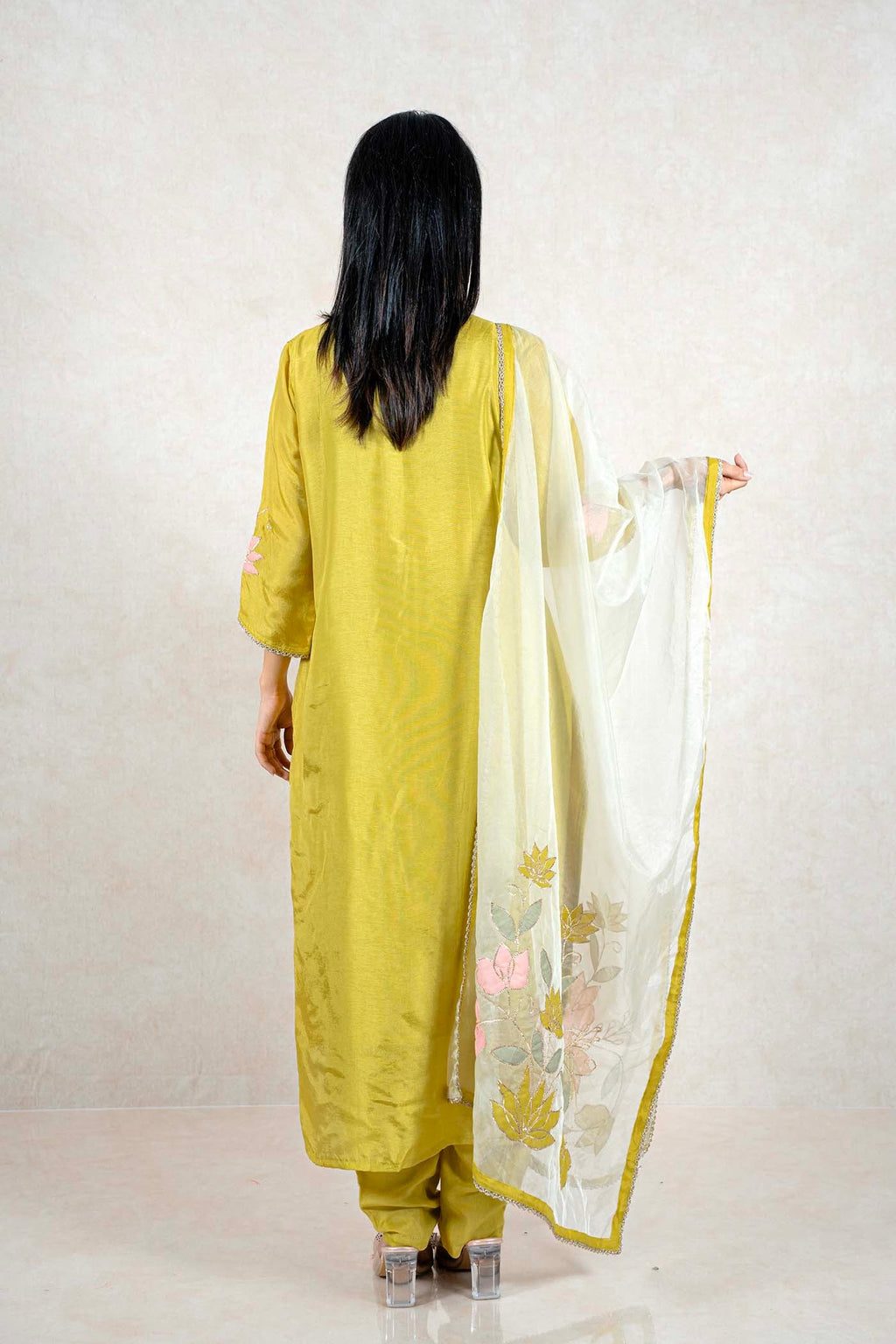 Raysham Fashion olive green silk kurta set with floral embroidered dupatta worn by a woman, back view