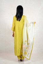 Raysham Fashion olive green silk kurta set with floral embroidered dupatta worn by a woman, back view