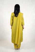 Back view of a woman wearing a Raysham Fashion olive green silk blend kurta set with gold embroidery and dupatta.
